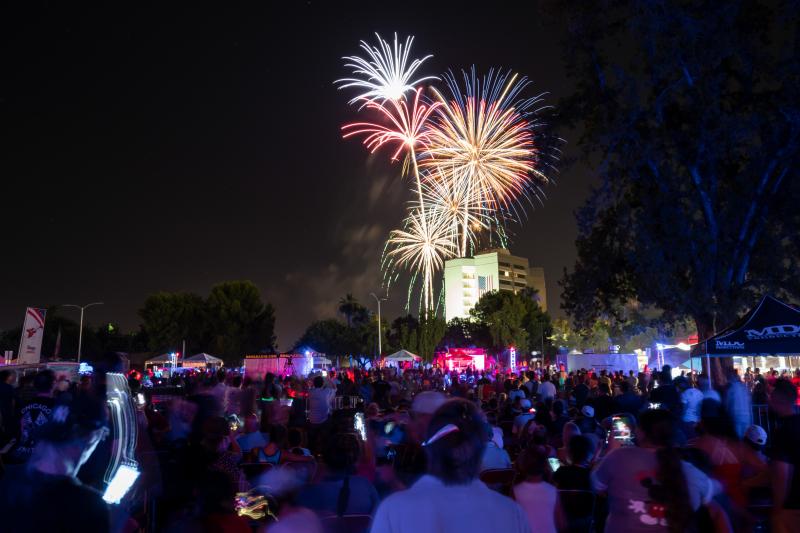 Fireworks over crowd at Willmeng Arizona Celebration of Freedom