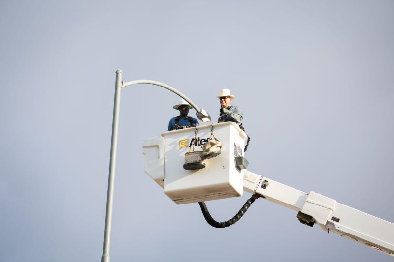 Harry Hammonds, Streetlight Technician, with Mayor Mark Freeman after final LED installation
