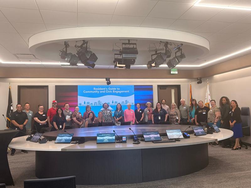 Photo of staff and residents at Resident's Guide class at Mesa City Hall 