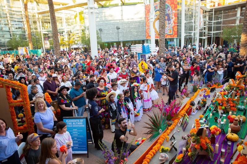 Crowd in front of the altar at 2024 Dia de los Muertos Festival at Mesa Arts Center 